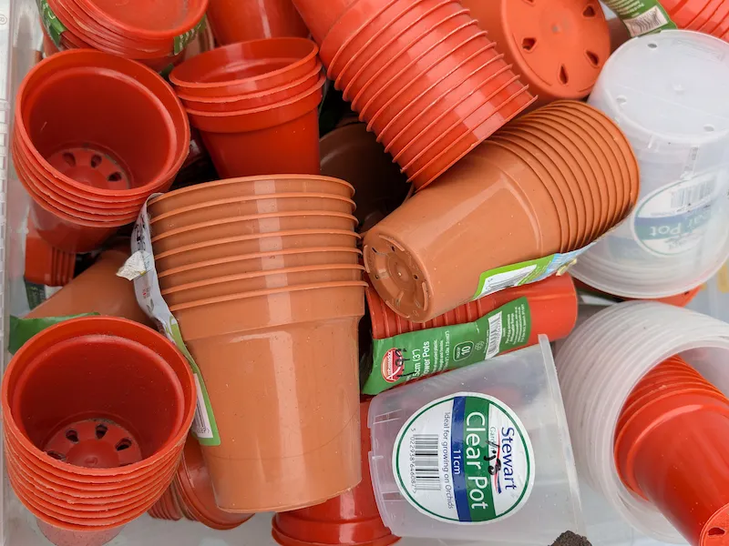 Gardening products range at Ideal Store in Newtongrange — gloves, plant care and outdoor essentials on the shelf